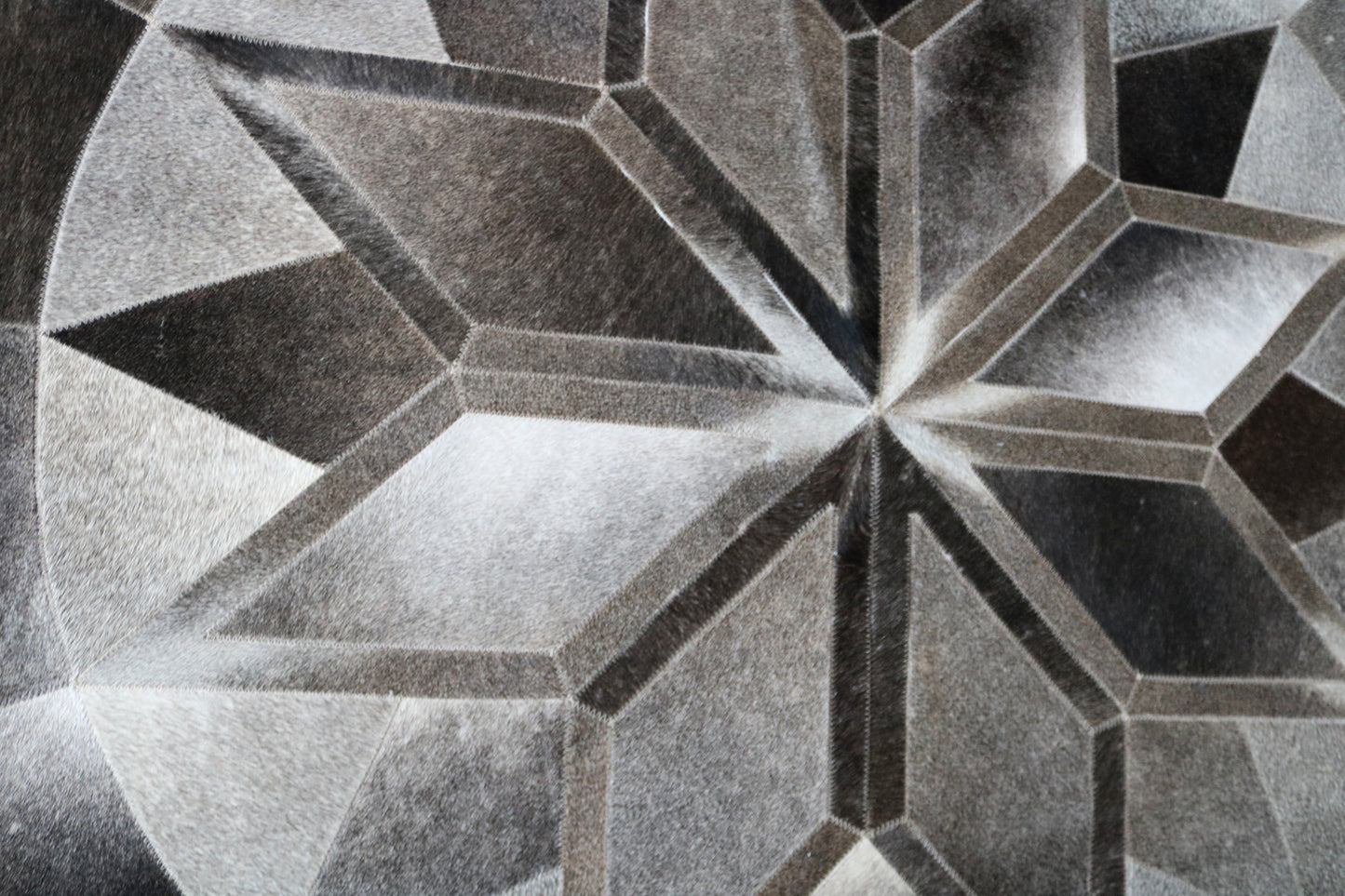 301091 Cowhide patchwork rug MANDALA ROUND. Quebecuir Premium Collection
