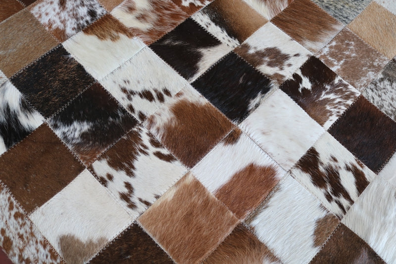100051 Tricolor Cowhide Patchwork Rug. Quebecuir Premium Collection.
