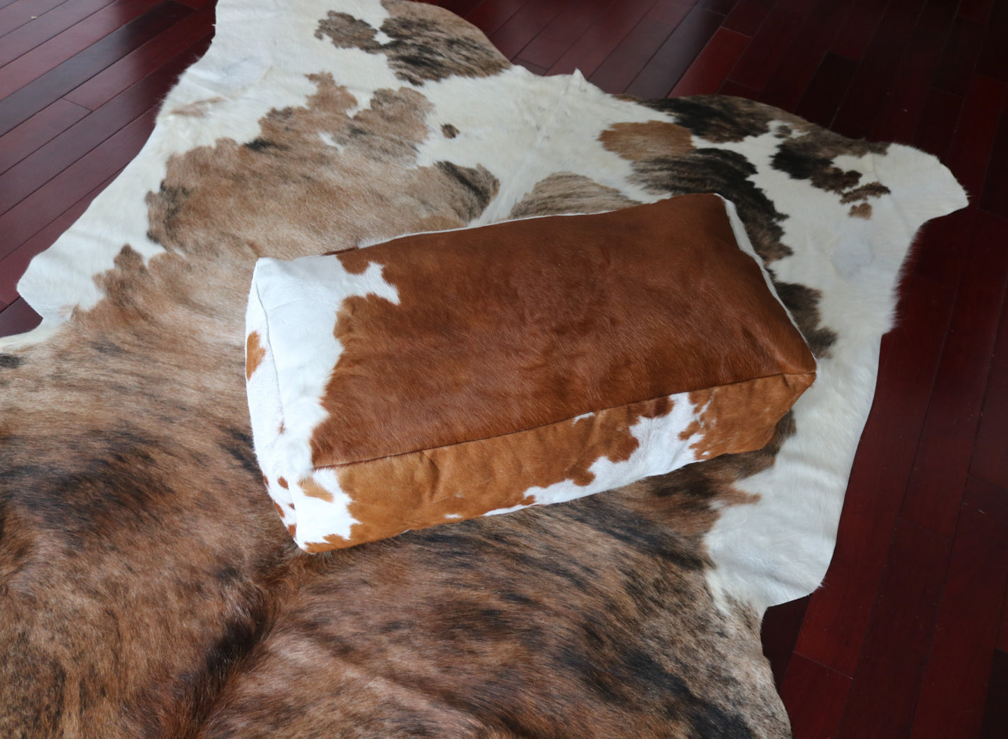30' Brown and white cowhide pouf. Code 400018