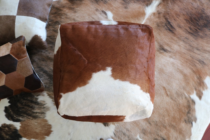 15' Brown and white cowhide pouf. 400019.