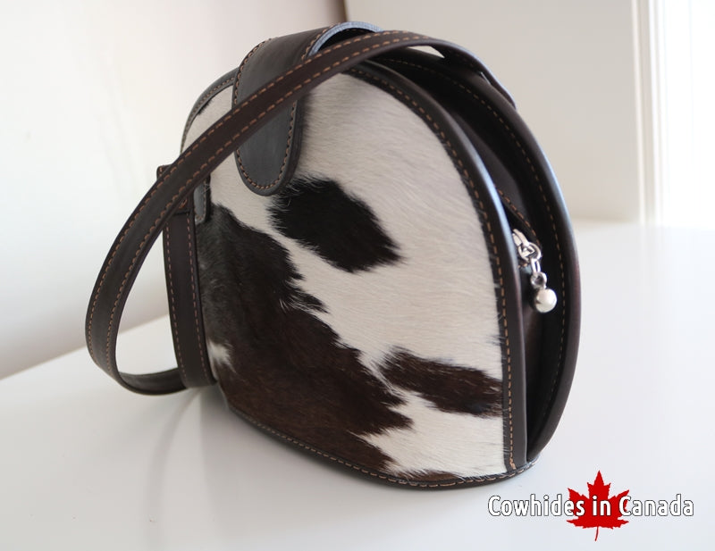 400100 Brown and white Cowhide Handbag.