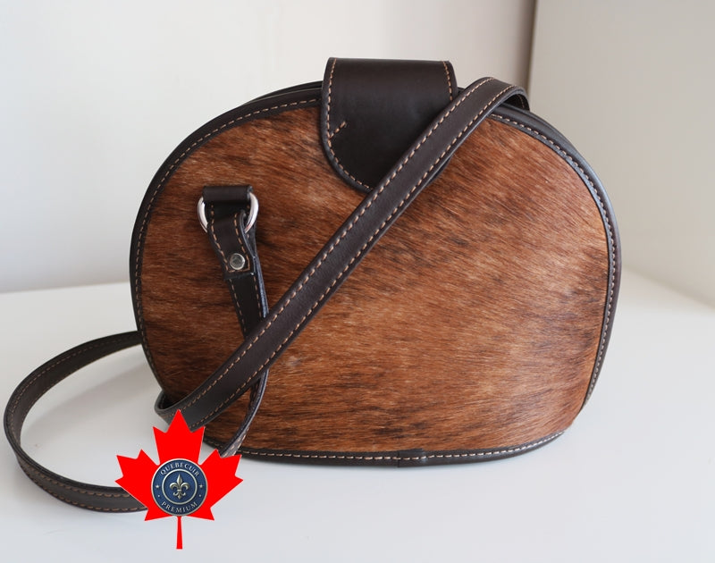 400100 Brown and white Cowhide Handbag.