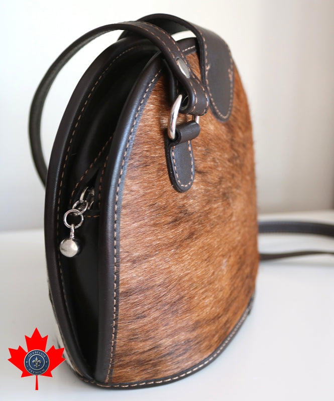 400100 Brown and white Cowhide Handbag.