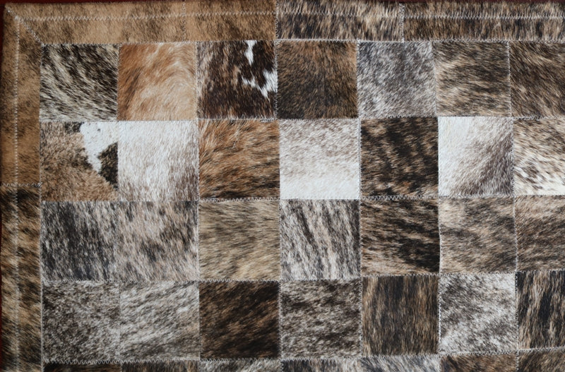 100050 Brindle Cowhide Patchwork Rug. Quebecuir Premium Collection.
