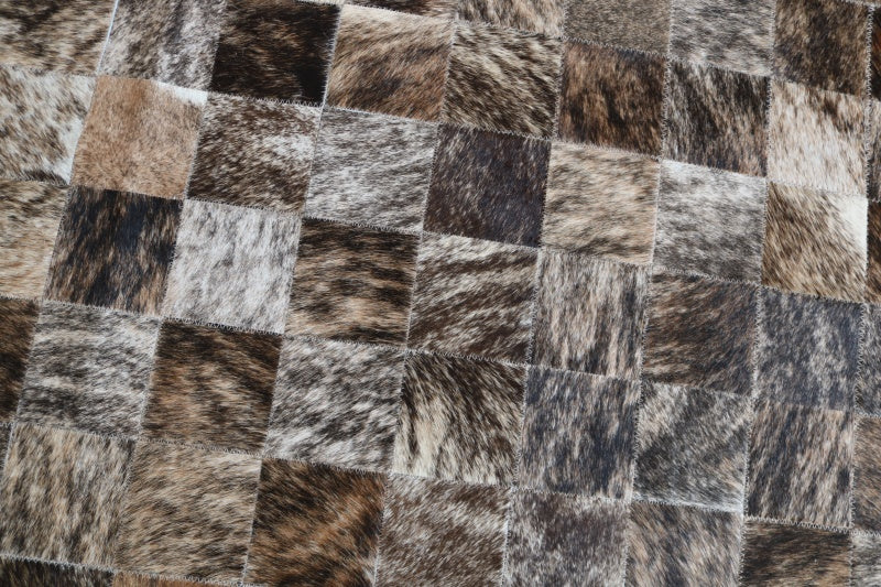 100050 Brindle Cowhide Patchwork Rug. Quebecuir Premium Collection.