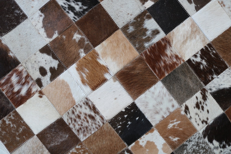 100051 Tricolor Cowhide Patchwork Rug. Quebecuir Premium Collection.