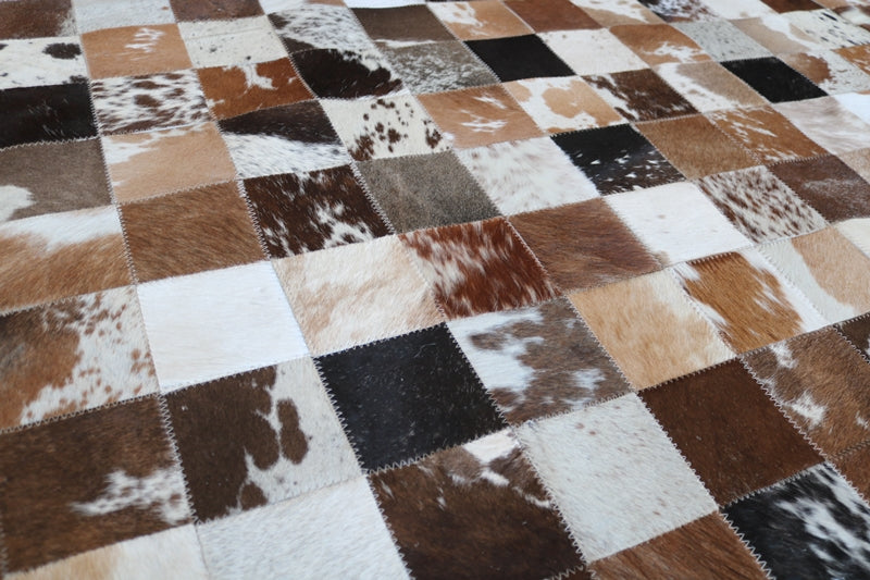 100051 Tricolor Cowhide Patchwork Rug. Quebecuir Premium Collection.