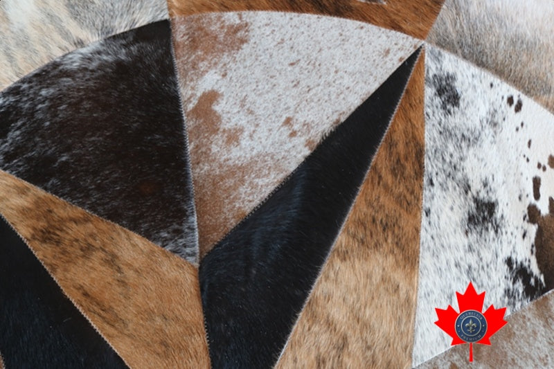 100076 Round Cowhide Patchwork Rug Tapis peau de vache . Quebecuir Premium Collection.