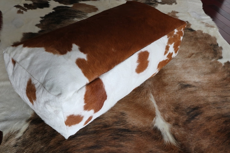30' Brown and white cowhide pouf. Code 400018